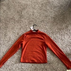 NEVER WORN/TAGS ON orange long sleeve turtle neck
